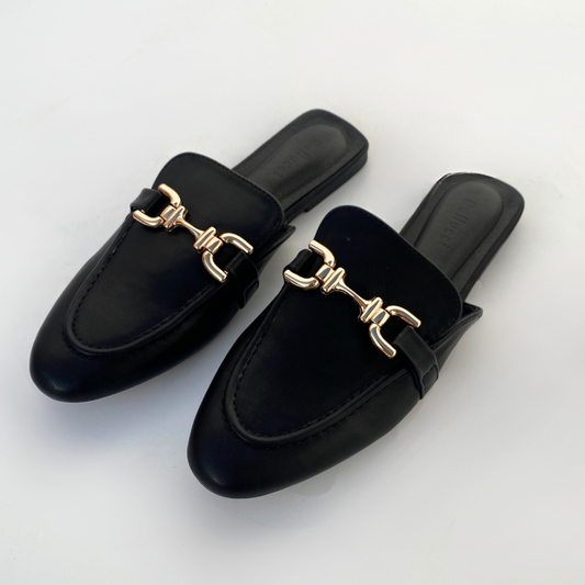 Mules plates en cuir