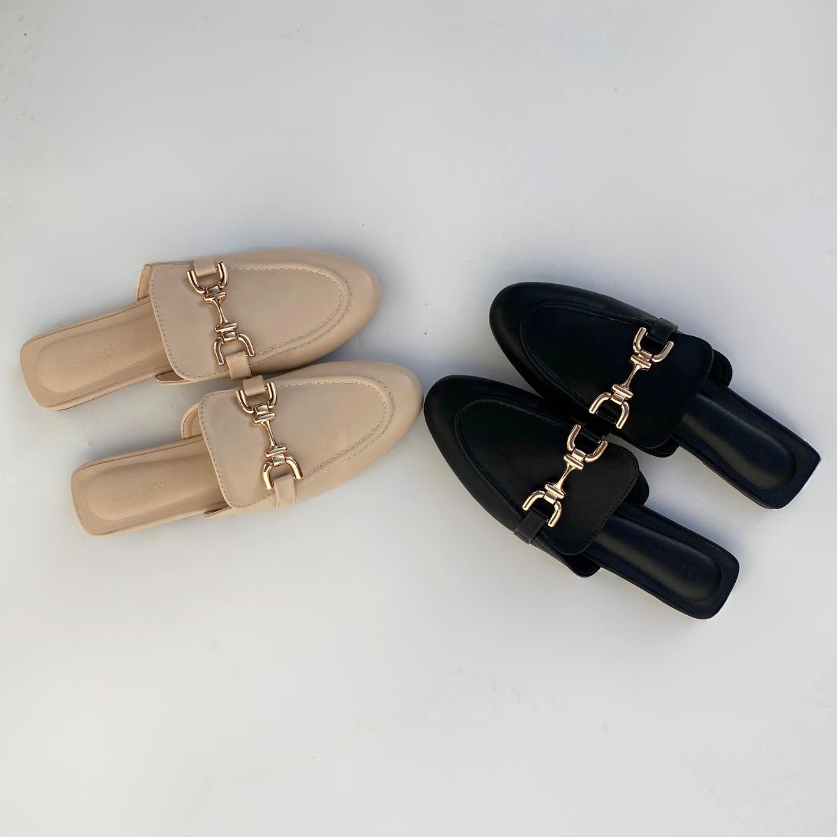 Mules plates en cuir