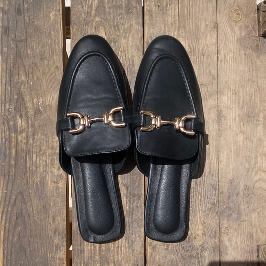 Mules plates en cuir